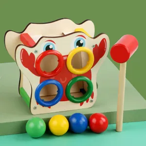 Wooden pounding bench toy with hammer and colorful balls for toddler early education learning.
