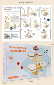 Wooden drum music station detail view showing packaging box and complete assembly instructions.