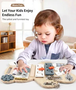 Close up detail of wooden Montessori busy board with various interactive locks and gears.