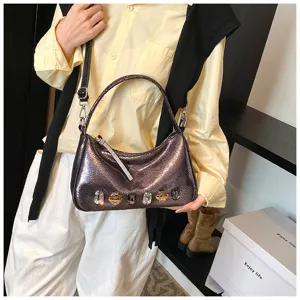 Modische metallische Schultertasche mit Strass und Edelstein Details für Damen.