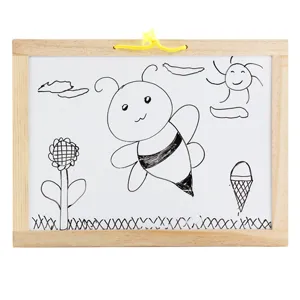Wooden magnetic whiteboard for kids with hanging string, ideal for writing and early education.