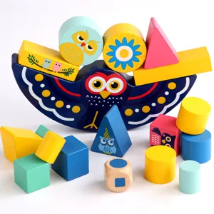 Wooden owl stacking balance blocks for kids, educational toy with colorful geometric shapes.