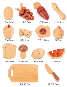 Wooden kitchen cutting toy set detail showing various wooden fruits and vegetables with sizes.