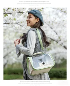 Outdoor pet carrier bag detail view showing transparent window and comfortable strap design.
