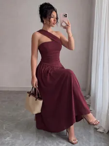 Elegant one-shoulder sleeveless pleated A-line midi dress in a chic deep burgundy shade.