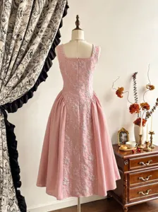 French elegant pink sleeveless midi dress with embossed floral details for women chic style.
