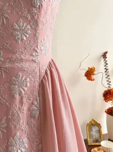 French elegant floral embossed pink midi dress detail, chic sleeveless design for autumn.