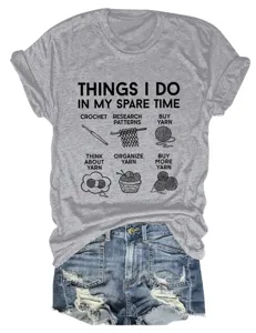 Grey short sleeve t-shirt featuring funny crochet graphic paired with denim shorts detail.