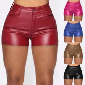 Close-up detail showing the high-waisted glossy PU leather shorts with multiple color options.
