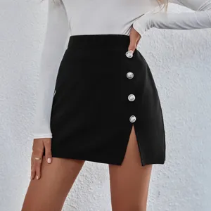 Close-up view of women's high waist black mini skirt featuring stylish silver buttons and slit.
