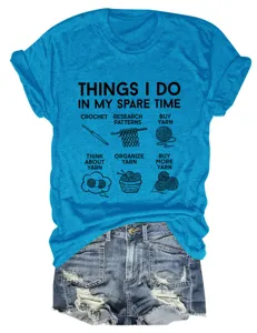 Blue graphic t-shirt for women featuring funny yarn and crochet slogans, casual short sleeve top.