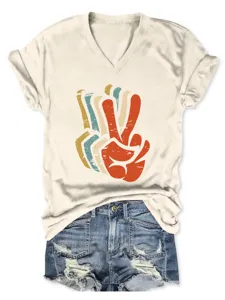 Stylish casual women V-neck short sleeve T-shirt with retro peace sign graphic print.