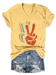 Casual yellow V-neck short sleeve tee featuring a retro multi-color peace hand gesture print.