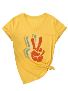 Women yellow V-neck short sleeve T-shirt featuring retro peace sign graphic and knot detail.