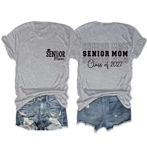 Close up view of gray senior mom graduation t-shirt paired with denim shorts details.