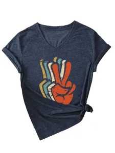 Close-up of dark grey V-neck t-shirt with rolled sleeves, side knot, and retro peace hand print.