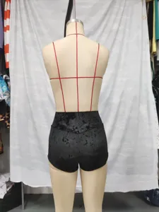 Back view detail of women's black velvet high-waisted slim stretch outdoor casual hot shorts.