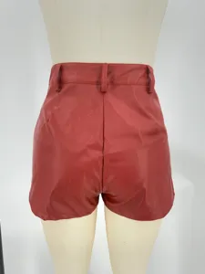 Back view detail of women red PU leather high waist bodycon shorts, stylish apparel.