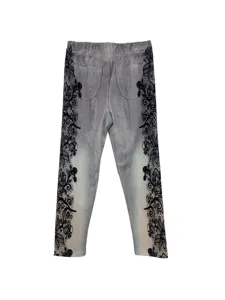 Detailed view of women printed leggings with fake denim wash and lace side patterns