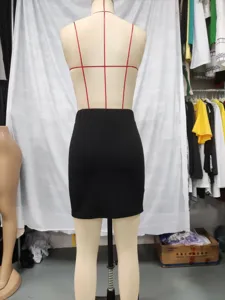 Detailed view of women's black high-waisted solid color bodycon mini skirt back design.