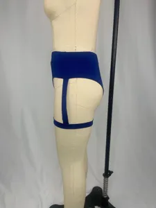 Detail view of sexy high-waisted blue shorts with garter straps for women workout fitness.