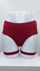 Red high waist shorts with thigh straps detail showing sexy butt lifting design closely.