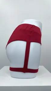Red high-waist sexy hip-lifting shorts detail view showing elastic fabric and straps.