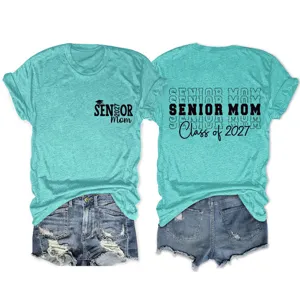 Close-up view of the turquoise senior mom t-shirt front and back print details and denim shorts.