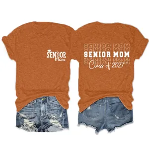 Detail view of the caramel senior mom class of 2027 short sleeve t-shirt graphic apparel.