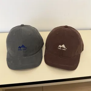 Washed cotton short brim baseball cap with mountain embroidery, casual outdoor sun hat.