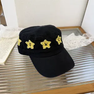 Japanese vintage black flat top cap featuring unique yellow frayed star patches design.