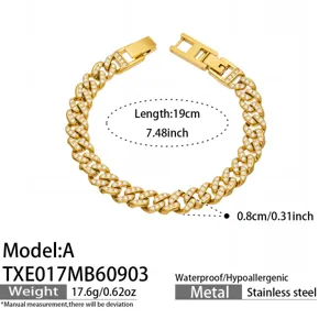 Gold stainless steel cuban chain bracelet detail view with sparkling zircon stones and clasp.