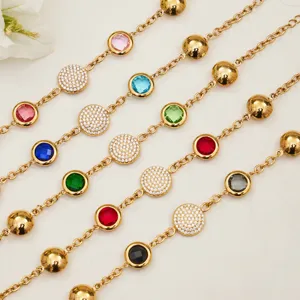 Stainless steel colorful cubic zirconia station bracelet set featuring round paved charms