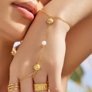 Elegante brazalete de esclava de acero dorado con concha perla y circonita mujer.