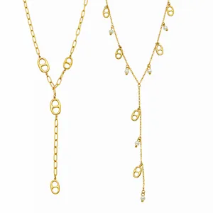 Gold Y-shaped necklace set with pearl and geometric link details, elegant stainless steel jewelry.