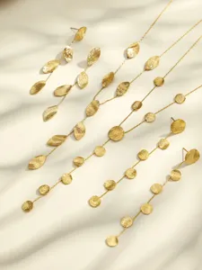 Gold hammered disc leaf tassel earrings Y necklace set detailed view for women fashion.