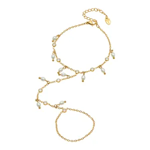 Pulsera de mano de acero de titanio con perlas y cristales estilo francés para mujer.