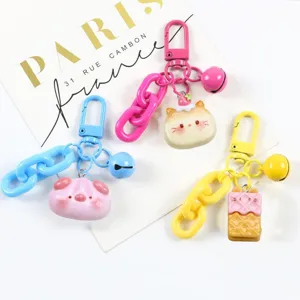 Cute resin cartoon animal biscuit keychain set, colorful metal clasp bag pendant accessory.
