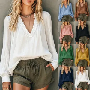 Women long sleeve ruffle V-neck blouse lantern sleeve casual chic stylish shirt detail view.
