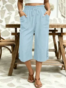 Comfortable women's casual light blue cropped pants featuring elastic drawstring waist.
