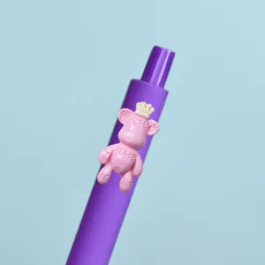 Cute purple gel pen detail shot featuring a sweet pink crowned bear resin patch decoration.