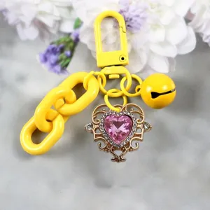 Porte-clés en alliage ajouré kawaii avec cristal cœur rose et chaîne jaune pour femmes!