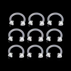 Clear flexible horseshoe piercing retainer detail, 16G 1.2mm transparent body jewelry.