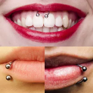 Detail shot showing stainless steel horseshoe rings worn on lips and mouth piercings.