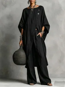 Modisches Damen asymmetrisches schwarzes Oberteil und weite Hosen Freizeit-Sets.