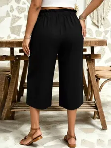 Casual solid color loose high waist women's cropped pants for daily wear and outdoor style.