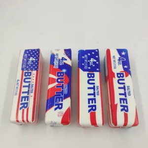 Detailansicht von vier Butterstangen-Knautschspielzeugen mit US-Flaggen-Design zum Stressabbau