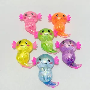 Nahaufnahme von sechs bunten glitzernden Axolotl Stressspielzeugen für effektiven Stressabbau