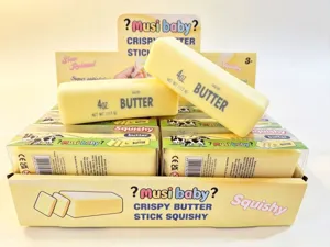 Detailed view of yellow crispy butter stick squishies in a retail display box