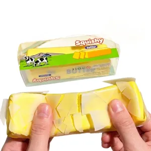 Crispy butter squishy stress relief toy shown in packaging and hands-on use